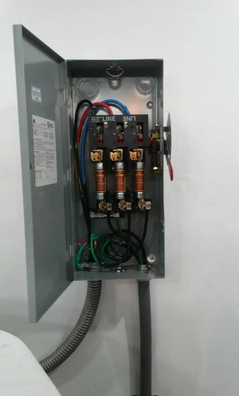 Three-phase disconnect switch installed for Smoke Detector Installation in Minot
